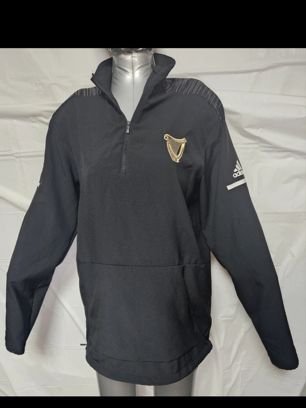 Guiness Black 1/4-Zip Performance Jacket with Gold Harp Crest